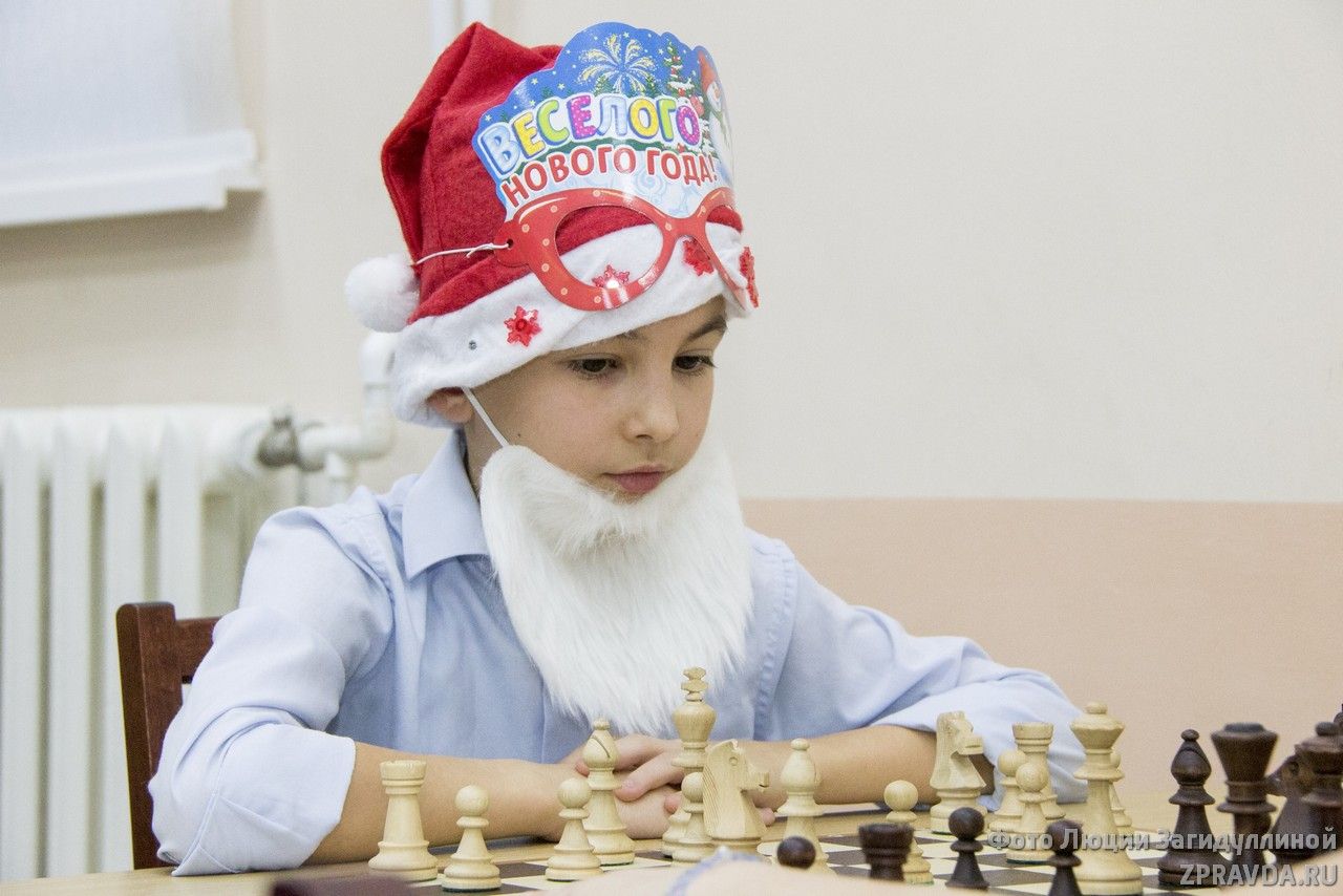 Фото: Новогодний блицтурнир по шахматам среди детей и и взрослых